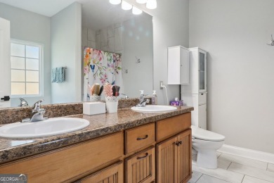 Imagine retreating to your spacious master suite on the main on Black Creek Golf Club in Georgia - for sale on GolfHomes.com, golf home, golf lot