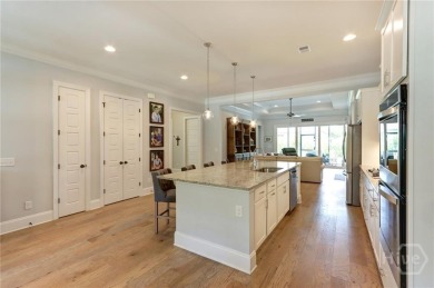 This lovely paired home just inside the main gate offers the on Savannah Quarters Country Club in Georgia - for sale on GolfHomes.com, golf home, golf lot