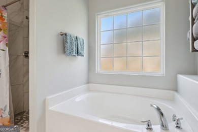 Imagine retreating to your spacious master suite on the main on Black Creek Golf Club in Georgia - for sale on GolfHomes.com, golf home, golf lot