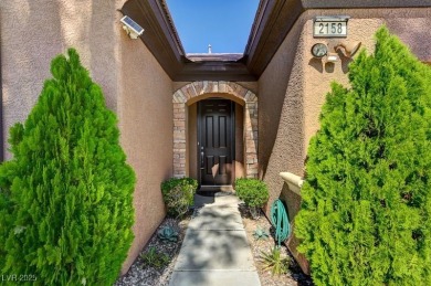 Stunning single story home with over $50,000 in upgrades. They on Revere Golf Club in Nevada - for sale on GolfHomes.com, golf home, golf lot