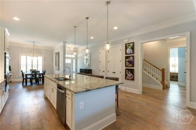 This lovely paired home just inside the main gate offers the on Savannah Quarters Country Club in Georgia - for sale on GolfHomes.com, golf home, golf lot