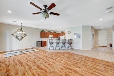 Stunning single story home with over $50,000 in upgrades. They on Revere Golf Club in Nevada - for sale on GolfHomes.com, golf home, golf lot