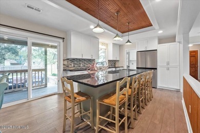 You'll barely break a sweat getting to the beach from McGlamery on Oak Island Golf Club in North Carolina - for sale on GolfHomes.com, golf home, golf lot