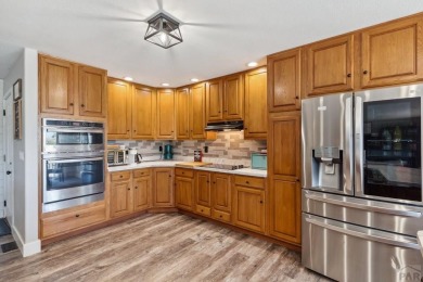 This beautifully updated rancher is a true gem--backing right up on Desert Hawk At Pueblo West in Colorado - for sale on GolfHomes.com, golf home, golf lot