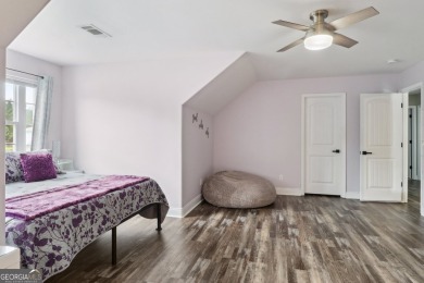 Imagine retreating to your spacious master suite on the main on Black Creek Golf Club in Georgia - for sale on GolfHomes.com, golf home, golf lot
