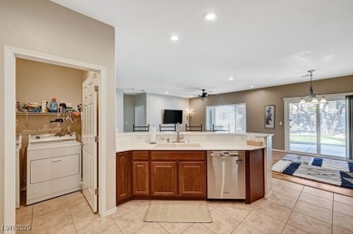 Stunning single story home with over $50,000 in upgrades. They on Revere Golf Club in Nevada - for sale on GolfHomes.com, golf home, golf lot