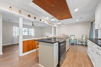 You'll barely break a sweat getting to the beach from McGlamery on Oak Island Golf Club in North Carolina - for sale on GolfHomes.com, golf home, golf lot