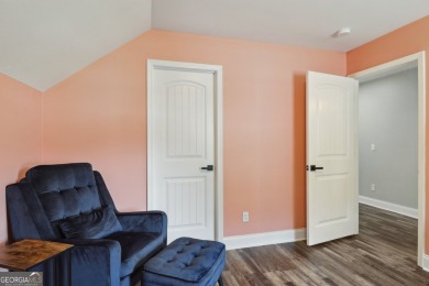 Imagine retreating to your spacious master suite on the main on Black Creek Golf Club in Georgia - for sale on GolfHomes.com, golf home, golf lot