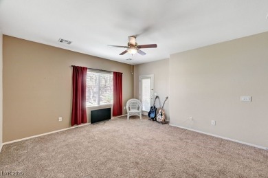 Stunning single story home with over $50,000 in upgrades. They on Revere Golf Club in Nevada - for sale on GolfHomes.com, golf home, golf lot