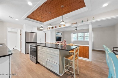 You'll barely break a sweat getting to the beach from McGlamery on Oak Island Golf Club in North Carolina - for sale on GolfHomes.com, golf home, golf lot