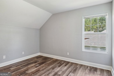 Imagine retreating to your spacious master suite on the main on Black Creek Golf Club in Georgia - for sale on GolfHomes.com, golf home, golf lot