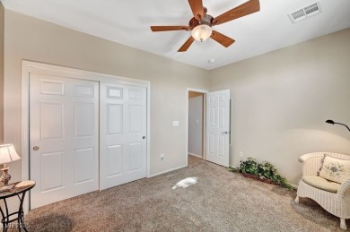 Stunning single story home with over $50,000 in upgrades. They on Revere Golf Club in Nevada - for sale on GolfHomes.com, golf home, golf lot