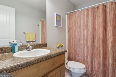 Imagine retreating to your spacious master suite on the main on Black Creek Golf Club in Georgia - for sale on GolfHomes.com, golf home, golf lot