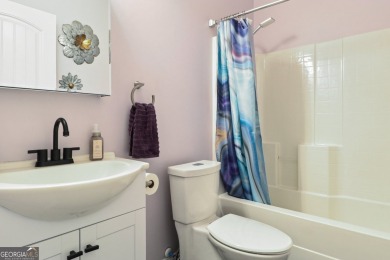 Imagine retreating to your spacious master suite on the main on Black Creek Golf Club in Georgia - for sale on GolfHomes.com, golf home, golf lot