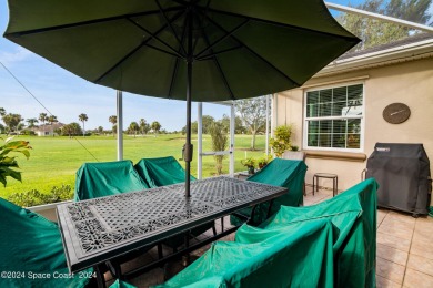 Discover unparalleled luxury in this charming villa nestled on a on Viera East Golf Club in Florida - for sale on GolfHomes.com, golf home, golf lot