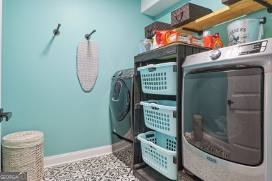 Imagine retreating to your spacious master suite on the main on Black Creek Golf Club in Georgia - for sale on GolfHomes.com, golf home, golf lot