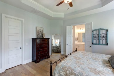 This lovely paired home just inside the main gate offers the on Savannah Quarters Country Club in Georgia - for sale on GolfHomes.com, golf home, golf lot