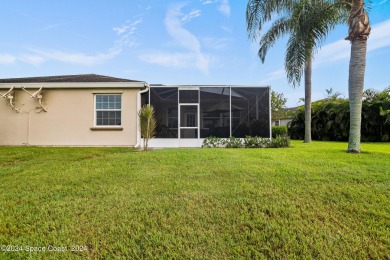 Discover unparalleled luxury in this charming villa nestled on a on Viera East Golf Club in Florida - for sale on GolfHomes.com, golf home, golf lot