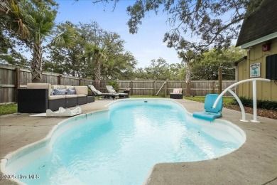 You'll barely break a sweat getting to the beach from McGlamery on Oak Island Golf Club in North Carolina - for sale on GolfHomes.com, golf home, golf lot