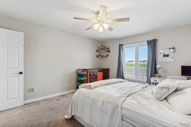 This beautifully updated rancher is a true gem--backing right up on Desert Hawk At Pueblo West in Colorado - for sale on GolfHomes.com, golf home, golf lot