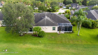 Discover unparalleled luxury in this charming villa nestled on a on Viera East Golf Club in Florida - for sale on GolfHomes.com, golf home, golf lot