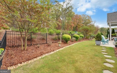 DUNWOODY Model  Covered front porch with brick elevation.  This on Chateau Elan Golf Club  in Georgia - for sale on GolfHomes.com, golf home, golf lot