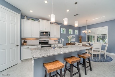 Furnished and move-in ready! Perfect Home. Perfect Views. This on Herons Glen Golf and Country Club in Florida - for sale on GolfHomes.com, golf home, golf lot