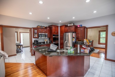 Located in the desirable Sand Creek community, this stunning on Sand Creek Golf and Country Club  in Indiana - for sale on GolfHomes.com, golf home, golf lot