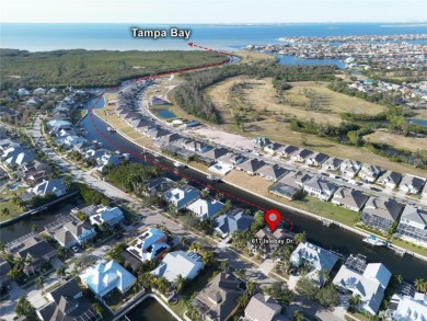 617 Islebay Drive - 3 Bed / 3.5 Bath / 3,050 Sq Ft - Office- on Apollo Beach Golf and Sea Club in Florida - for sale on GolfHomes.com, golf home, golf lot