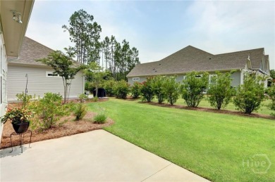 This lovely paired home just inside the main gate offers the on Savannah Quarters Country Club in Georgia - for sale on GolfHomes.com, golf home, golf lot