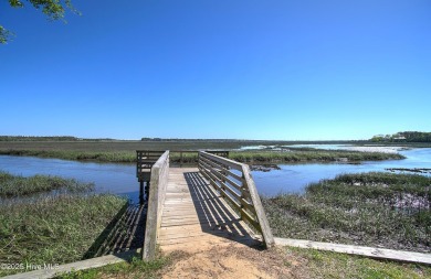 You'll barely break a sweat getting to the beach from McGlamery on Oak Island Golf Club in North Carolina - for sale on GolfHomes.com, golf home, golf lot