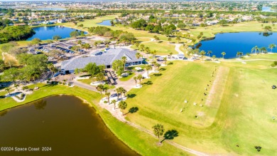 Discover unparalleled luxury in this charming villa nestled on a on Viera East Golf Club in Florida - for sale on GolfHomes.com, golf home, golf lot