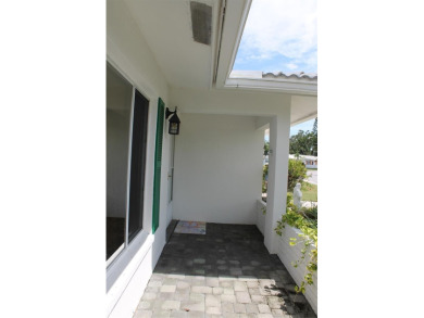 Waterfront with Wildlife  Wondrous Sunrise Views! Tropical on Mainlands Golf Club in Florida - for sale on GolfHomes.com, golf home, golf lot