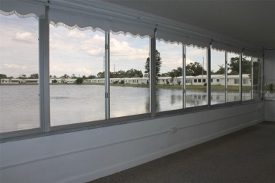Waterfront with Wildlife  Wondrous Sunrise Views! Tropical on Mainlands Golf Club in Florida - for sale on GolfHomes.com, golf home, golf lot