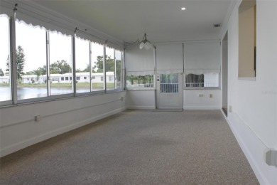 Waterfront with Wildlife  Wondrous Sunrise Views! Tropical on Mainlands Golf Club in Florida - for sale on GolfHomes.com, golf home, golf lot