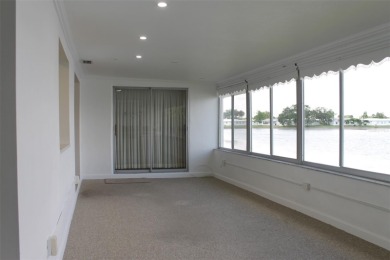 Waterfront with Wildlife  Wondrous Sunrise Views! Tropical on Mainlands Golf Club in Florida - for sale on GolfHomes.com, golf home, golf lot