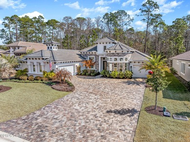 Experience luxury living at its finest in this exceptional 2023 on Plantation Bay Golf and Country Club in Florida - for sale on GolfHomes.com, golf home, golf lot