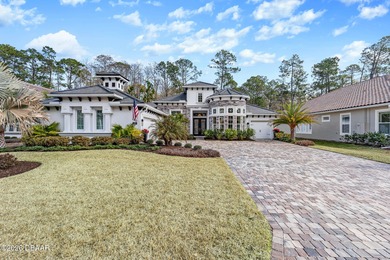 Experience luxury living at its finest in this exceptional 2023 on Plantation Bay Golf and Country Club in Florida - for sale on GolfHomes.com, golf home, golf lot