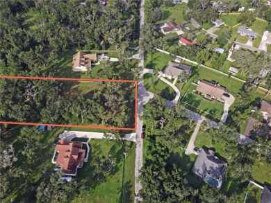 Build your private estate on 1.2 acres in the rolling hills of on Lake Jovita Golf and Country Club in Florida - for sale on GolfHomes.com, golf home, golf lot