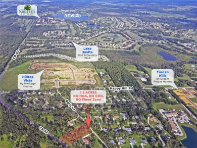 Build your private estate on 1.2 acres in the rolling hills of on Lake Jovita Golf and Country Club in Florida - for sale on GolfHomes.com, golf home, golf lot