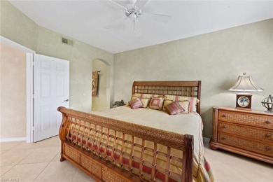 Experience resort-style living in this beautifully furnished on Shadow Wood Country Club in Florida - for sale on GolfHomes.com, golf home, golf lot