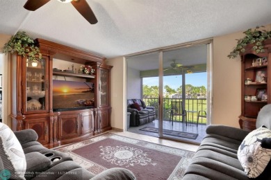 IMPACT WINDOWS ON MASTER BEDROOM, GUEST BEDROOM AND KITCHEN on Oriole Golf and Tennis Club in Florida - for sale on GolfHomes.com, golf home, golf lot