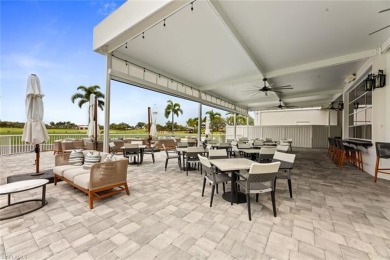 Experience resort-style living in this beautifully furnished on Shadow Wood Country Club in Florida - for sale on GolfHomes.com, golf home, golf lot