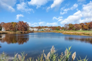 Extended Heritage model with full loft sits on a lakefront lot on Westlake Golf and Country Club in New Jersey - for sale on GolfHomes.com, golf home, golf lot