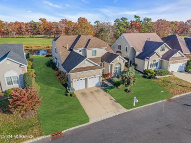 Extended Heritage model with full loft sits on a lakefront lot on Westlake Golf and Country Club in New Jersey - for sale on GolfHomes.com, golf home, golf lot