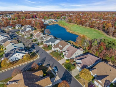 Extended Heritage model with full loft sits on a lakefront lot on Westlake Golf and Country Club in New Jersey - for sale on GolfHomes.com, golf home, golf lot