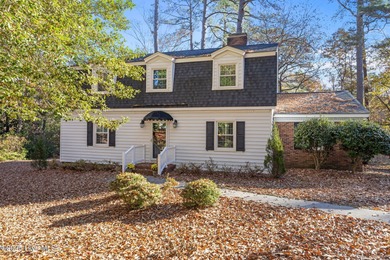 Welcome to 223 Churchill Drive, a charming and well-loved home on Brook Valley Country Club in North Carolina - for sale on GolfHomes.com, golf home, golf lot
