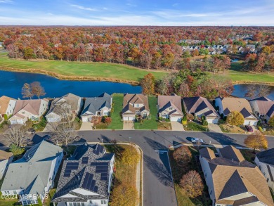 Extended Heritage model with full loft sits on a lakefront lot on Westlake Golf and Country Club in New Jersey - for sale on GolfHomes.com, golf home, golf lot