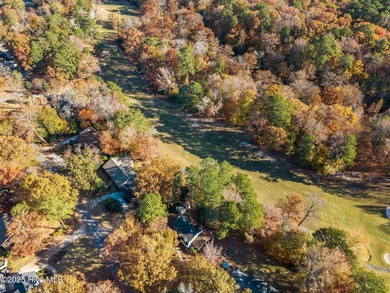 Welcome to 223 Churchill Drive, a charming and well-loved home on Brook Valley Country Club in North Carolina - for sale on GolfHomes.com, golf home, golf lot