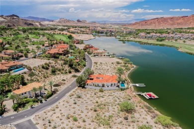 Oversized dock with HydroHoist boat lift and a 21' twin-screw on South Shore At Lake Las Vegas in Nevada - for sale on GolfHomes.com, golf home, golf lot